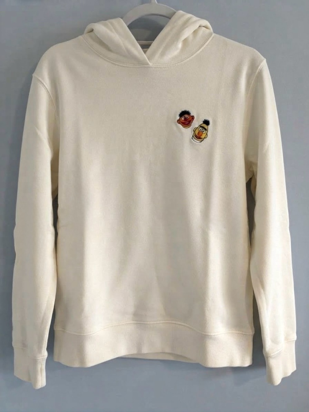 Uniqlo KAWS Sesame Street Cream Crewneck Hoodie with Embroidered Ernie & Bert